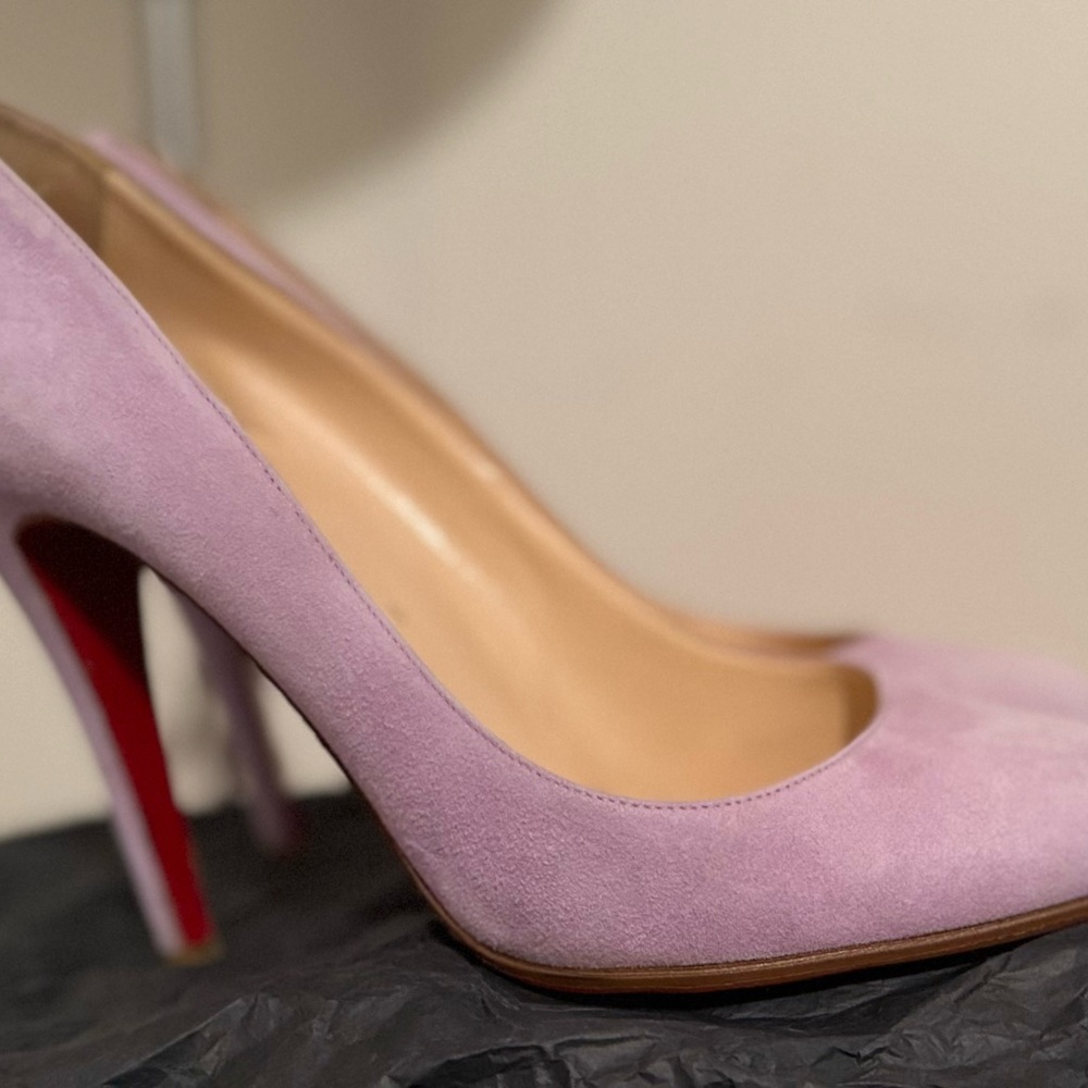 Light purple Christian Louboutin heels.